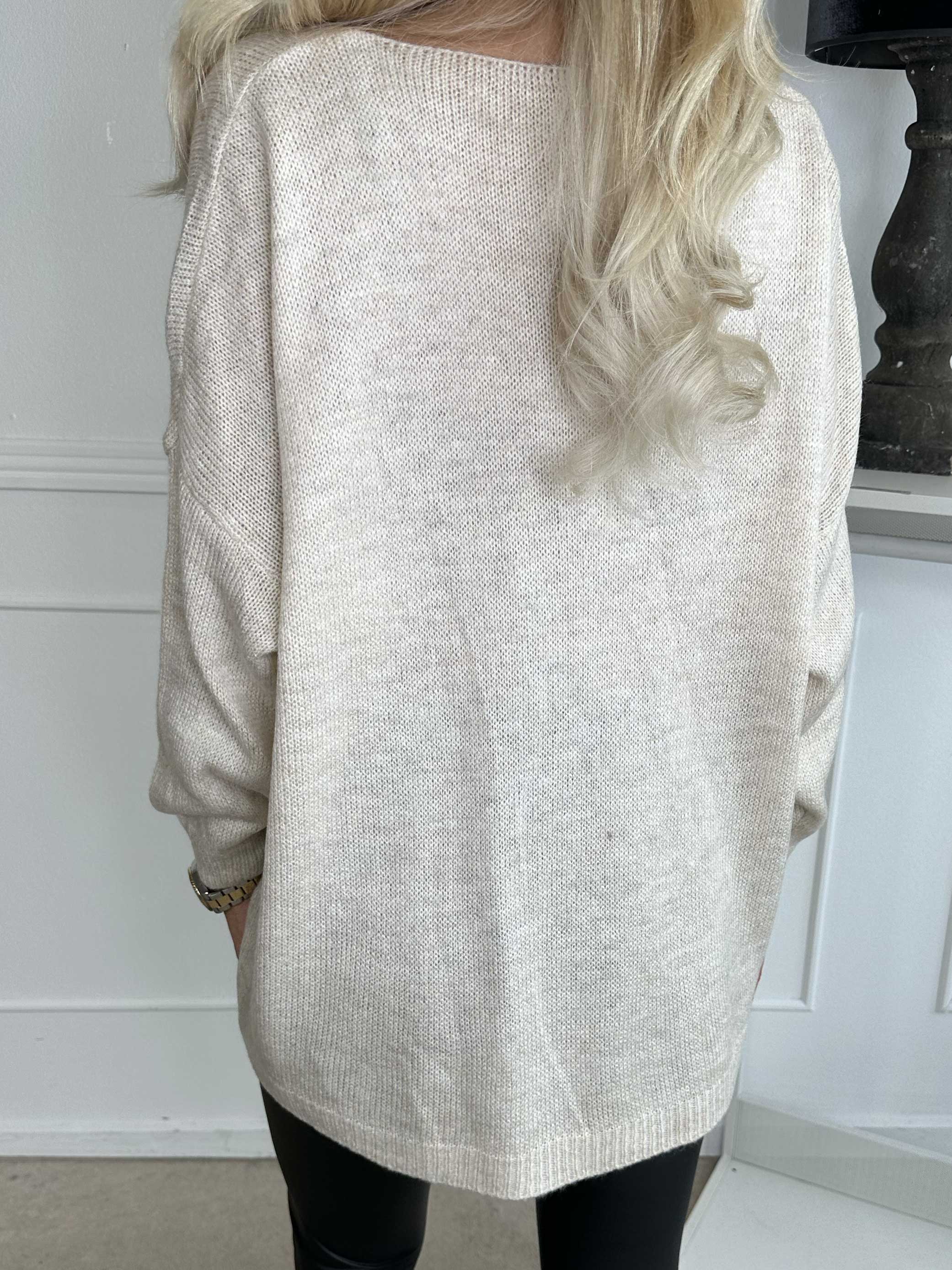 Omaria - Stickad blus med fyrverkerier på